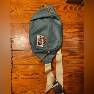 NorthFace hiking Hip/Back bag. EUC used once. Holds water bottle and things.